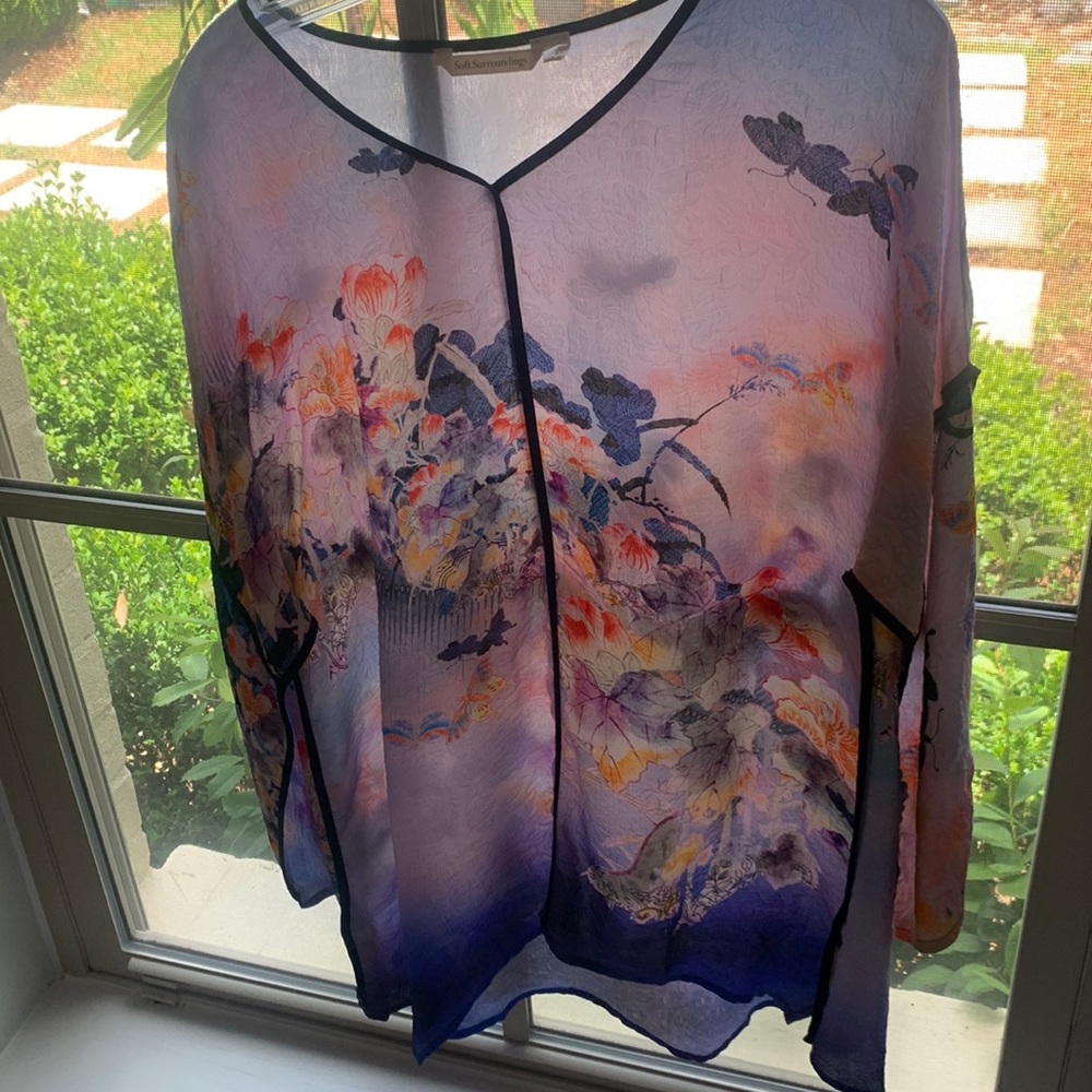 Soft surrounding tunic top